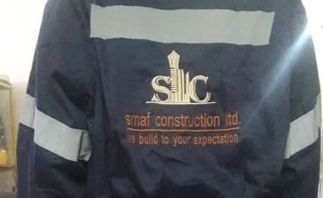 SMAF Construction workers with company logo